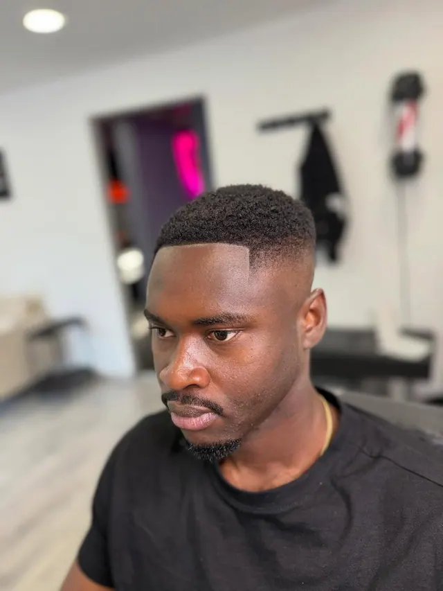 A crop with a skin fade and a line-up